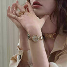 Kobine Women's Grunge Multiple Embossed Medallions Bracelet
